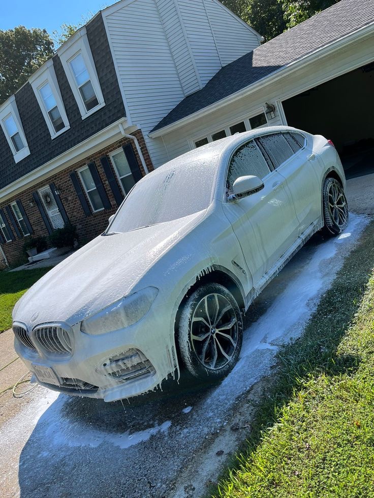 Prime Detailing Auto Care foam wash on a luxury SUV